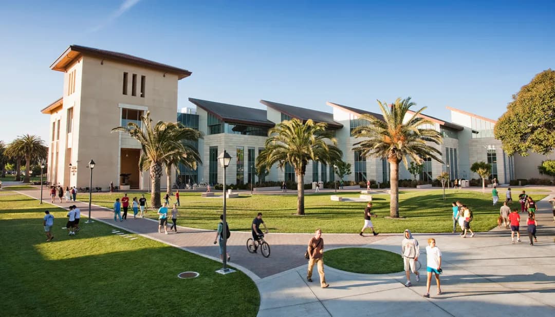 Palm trees and students walking on the ASU Tempe campus